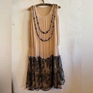 SOLD  Antique 1920’s Beige Silk Chiffon Dress with Beads and Black Lace Overlay.
